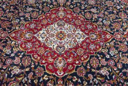 Central medallion detail of New Kashan rug from Iran / Persia