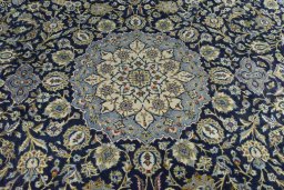 Central medallion detail of 2000s Kashan rug from Iran / Persia