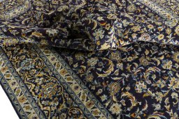 Surface texture of 2000s Kashan rug with natural Wool and intricate pattern
