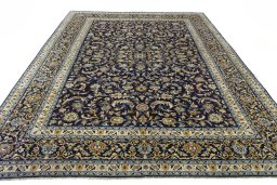 Surface texture of 2000s Kashan rug with natural Wool and intricate pattern