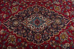 Central medallion detail of 2000s Kashan rug from Iran / Persia