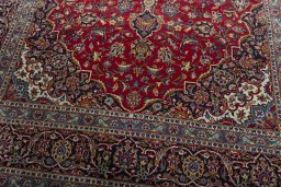 Close-up detail of 2000s Kashan rug from Iran / Persia showing Wool weave