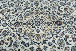 Central medallion detail of 2000s Kashan rug from Iran / Persia