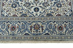 Full view of 2000s Kashan rug from Iran / Persia, 295 × 200 cm in Beige tones