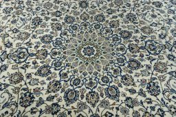 Central medallion detail of 2000s Kashan rug from Iran / Persia