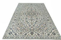 Surface texture of 2000s Kashan rug with natural Wool and intricate pattern