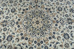 Central medallion detail of 2000s Kashan rug from Iran / Persia