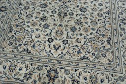 Close-up detail of 2000s Kashan rug from Iran / Persia showing Wool weave