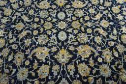 Central medallion detail of 2000s Kashan rug from Iran / Persia