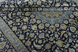 Close-up detail of 2000s Kashan rug from Iran / Persia showing Cork weave