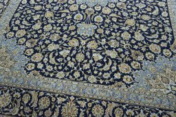 Close-up detail of 2000s Kashan rug from Iran / Persia showing Cork weave