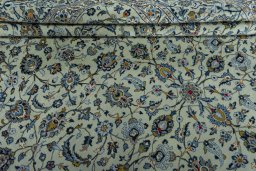 Close-up detail of 2000s Kashan rug from Iran / Persia showing Wool weave