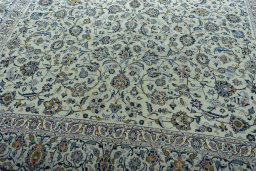 Close-up detail of 2000s Kashan rug from Iran / Persia showing Wool weave