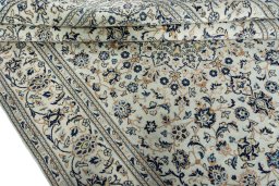 Close-up detail of 2000s Kashan rug from Iran / Persia showing Wool weave