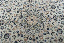 Central medallion detail of 2000s Kashan rug from Iran / Persia