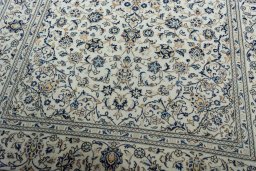 Close-up detail of 2000s Kashan rug from Iran / Persia showing Wool weave