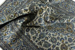 Surface texture of 2000s Kashan rug with natural Wool and intricate pattern
