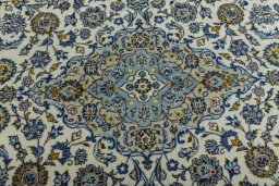 Central medallion detail of 2000s Kashan rug from Iran / Persia