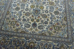 Close-up detail of 2000s Kashan rug from Iran / Persia showing Wool weave