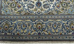 Full view of 2000s Kashan rug from Iran / Persia, 305 × 197 cm in Beige tones