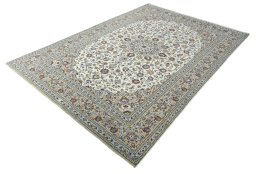 Corner detail of 2000s Kashan rug showing border pattern and Wool pile