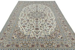 Surface texture of 2000s Kashan rug with natural Wool and intricate pattern