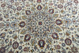Central medallion detail of 2000s Kashan rug from Iran / Persia