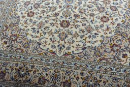 Close-up detail of 2000s Kashan rug from Iran / Persia showing Wool weave