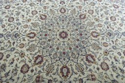 Central medallion detail of 2000s Kashan rug from Iran / Persia