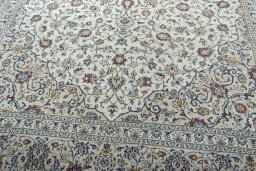 Close-up detail of 2000s Kashan rug from Iran / Persia showing Wool weave