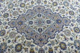 Central medallion detail of 2000s Kashan rug from Iran / Persia
