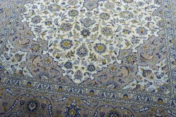 Close-up detail of 2000s Kashan rug from Iran / Persia showing Wool weave