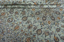 Close-up detail of 2000s Kashan rug from Iran / Persia showing Wool weave