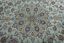 Central medallion detail of 2000s Kashan rug from Iran / Persia