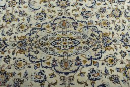 Central medallion detail of 2000s Kashan rug from Iran / Persia