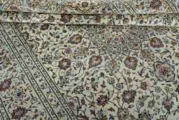 Close-up detail of 2000s Kashan rug from Iran / Persia showing Wool weave