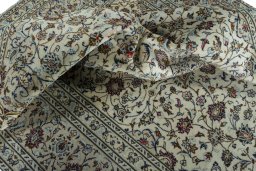 Surface texture of 2000s Kashan rug with natural Wool and intricate pattern