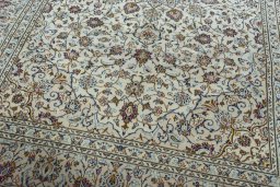 Close-up detail of 2000s Kashan rug from Iran / Persia showing Wool weave