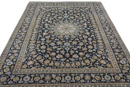 Surface texture of 2000s Kashan rug with natural Wool and intricate pattern