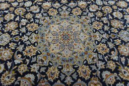 Central medallion detail of 2000s Kashan rug from Iran / Persia
