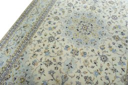 Backside of handmade 2000s Kashan rug showing knot structure and weave density