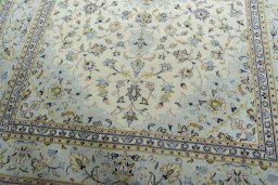 Close-up detail of 2000s Kashan rug from Iran / Persia showing Wool weave