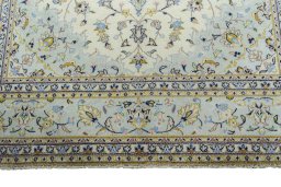 Full view of 2000s Kashan rug from Iran / Persia, 295 × 196 cm in Beige tones
