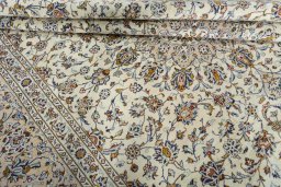 Close-up detail of 2000s Kashan rug from Iran / Persia showing Wool weave