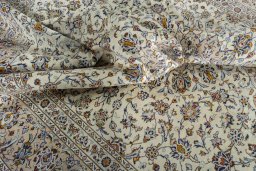 Surface texture of 2000s Kashan rug with natural Wool and intricate pattern