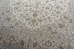 Close-up detail of 2000s Kashan rug from Iran / Persia showing Wool weave