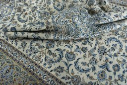 Surface texture of 2000s Kashan rug with natural Wool and intricate pattern