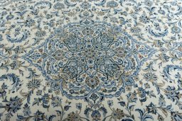 Central medallion detail of 2000s Kashan rug from Iran / Persia