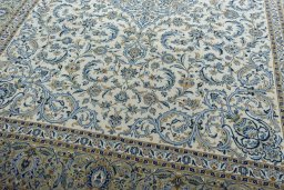 Close-up detail of 2000s Kashan rug from Iran / Persia showing Wool weave