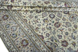 Close-up detail of 2000s Kashan rug from Iran / Persia showing Wool weave
